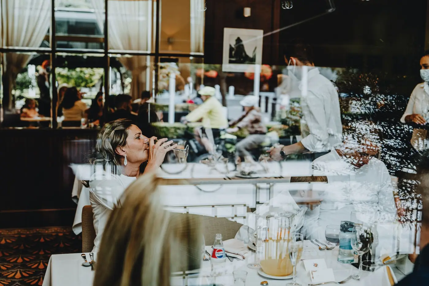 A guest at a table in a casual dining room